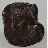 A BLACK FOREST DESIGN CARVED WOODEN DOG TOBACCO JAR with glass eyes. 7ins high.