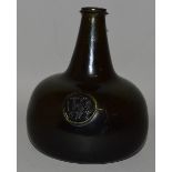 A GOOD TRANSITIONAL PERIOD ONION/BLADDER BLACK GLASS BOTTLE, dated 1713, T. S. with two stars,