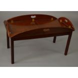 A GEORGIAN STYLE MAHOGANY BUTLERS FOLDING TRAY ON STAND. 4ft 5ins.