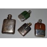 FOUR SMALL WHISKY FLASKS.