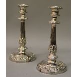 A GOOD PAIR OF OLD SHEFFIELD PLATE MATHEW BOULTON CIRCULAR CANDLESTICKS decorated with acanthus