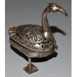 A SMALL PIERCED ISLAMIC SILVER BIRD BOX with hinged top 3.25ins high.