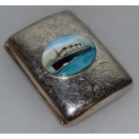 A GEORGE V SILVER CIGARETTE CASE, Birmingham 1912, with an oval of a ship.