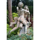 A GOOD CAST METAL GARDEN FIGURE GROUP, depicting a fawn in an embrace with a nubile female nude,