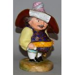 A ROYAL CROWN DERBY MANSION DWARF wearing a moustache, his hat with an advertisement for ‘The