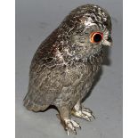 AN OWL with detachable head 6ins high.