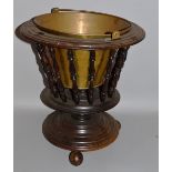 A DUTCH MAHOGANY PIERCED BUCKET with brass liner and handle 16ins high.