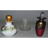 AN ART NOUVEAU STYLE SCENT BOTTLE AND STOPPER, signed R. Held, 5ins high and two other small scent