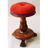 A VICTORIAN MAHOGANY CIRCULAR VELVET TOP PIANO STOOL, fluted column, circular base and claw feet.