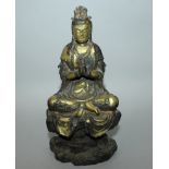 A CHINESE GILT BRONZE FIGURE OF AMITAYUS BUDDHA, seated in meditation on a cloud shrouded plinth,