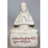 A GOOD 18TH/19TH CENTURY RAJASTHAN JAIN WHITE MARBLE FIGURE OF A JINA, seated in meditation on a