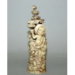 A 19TH/20TH CENTURY PIERCED & CARVED IVORY MODEL OF A SENNIN, unsigned, holding aloft a bowl and