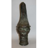 A LARGE AFRICAN BENIN STYLE BRONZE HEAD, with unpolished patination, 19.5in high.