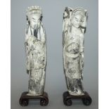 A FINE QUALITY PAIR OF EARLY 20TH CENTURY CHINESE CARVED IVORY COURT FIGURES, together with fitted