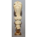 A VERY GOOD CARVED IVORY HANDLED DESK SEAL with cornelian intaglio crest in gold with a carved