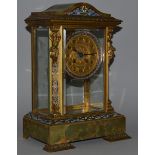 A GOOD 19TH CENTURY FRENCH BRONZE CHAMPLEVE ENAMEL AND GREEN ONYX FOUR GLASS CLOCK with eight day