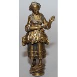 A 19TH CENTURY BRASS CAST FIGURAL DESK SEAL with oval intaglio, inscribed THINKING OF ME, surmounted