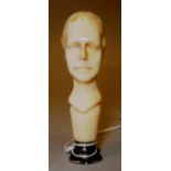 A GOOD CARVED IVORY SEAL as the bust of a man. Initials J. C. 21/4ins long.