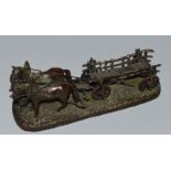 A GOOD SMALL RUSSIAN BRONZE OF TWO HORSE AND CART. 6.5ins long.