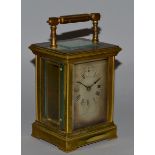 A GOOD 19TH CENTURY FRENCH BRASS CARRIAGE "ALARM" CLOCK with silvered dial, GOLDSMITHS &