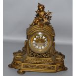 A 19TH CENTURY BRONZE MANTLE CLOCK SET, clock and side pieces, eight day movement, black and white