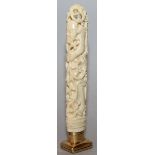 A GOOD CARVED AND PIERCED IVORY HANDLED DESK SEAL, the rounded rectangular cornelian intaglio