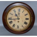 A SMALL GEORGE VI 7.5-INCH WALL CLOCK in a mahogany case.