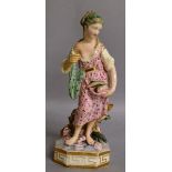 AN EARLY 19TH CENTURY DERBY FIGURE OF A GIRL gathering fish, standing on a Greek Key moulded base.