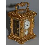 A GOOD SMALL 19TH CENTURY FRENCH BRASS CARRIAGE ALARM CLOCK, the sides with caryatid figures, bell