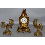 A 19TH CENTURY BRONZE ROCOCO STYLE CLOCK SET, clock and side pieces with eight day movement, black