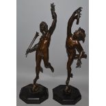 A FINE PAIR OF 18TH-19TH CENTURY BRONZES OF MERCURY AND VENUS standing on octagonal marble bases.