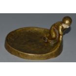 P. TANOSZIZOKA GILT BRONZE ASHTRAY with a young boy with ivory face.  Signed.  4.5ins.