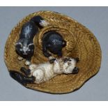 A SMALL VIENNA TYPE COLD CAST GROUP, cats on a straw hat.  3.5ins.