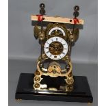 A LARGE BRASS SKELETON CLOCK with fusee movement in a glass case.  15ins high.