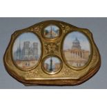 A GOOD FRENCH, CIRCA 1820, ENGRAVED SHAPED BRASS PURSE inset with four ovals.