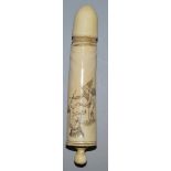 A GOOD CARVED IVORY PHALLUS engraved with a cupid and a woman, 7.25ins long, in a mahogany case, the