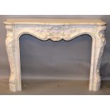 A GOOD LOUIS XVITH DESIGN CARVED WHITE MARBLE FIRE SURROUND, in the French taste. 4ft 8ins wide x