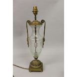A HOBNAIL CUT URN SHAPED LAMP with ormolu mounts 18ins high.