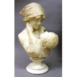 A VERY GOOD CARVED ALABASTER MODEL OF A MOTHER AND CHILD on a circular base 17ins high.