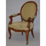 A VICTORIAN MAHOGANY OPEN ARMCHAIR with show wood frame, oval padded back and arms, padded seat