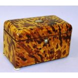 A REGENCY BLONDE TORTOISESHELL TWO DIVISION TEA CADDY with moulded top, on ivory bun feet 7.25ins