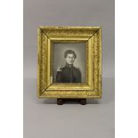 A PORTRAIT OF A YOUNG OFFICER, half length, Possibly French, in a gilt frame Signed 6ins x 4.5ins.