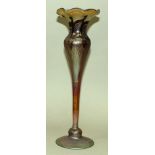 A TALL “TIFFANY” ART GLASS TRUMPET SHAPED VASE. 15ins high.