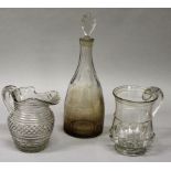 AN EARLY 18TH CENTURY GLASS FLUTED TANKARD, hobnail cut jug and a decanter and stopper.