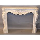 A GOOD CARVED WHITE MARBLE FIRE SURROUND, in the French taste. 4ft 8ins wide x 3ft 4ins high x 1ft