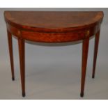 A GEORGE III MAHOGANY HALF MOON CARD TABLE with crossbanded folding top, green baize interior,