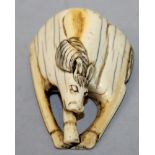 A GOOD LARGE 18TH/19TH CENTURY JAPANESE EDO PERIOD CARVED IVORY NETSUKE OF A GRAZING HORSE, its feet