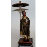 A GOOD SIGNED JAPANESE MEIJI PERIOD MIYAO TYPE PARCEL GILT BRONZE FIGURE OF A LADY, mounted on a