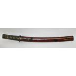 A GOOD JAPANESE WAKIZASHI SWORD WITH A 17TH CENTURY BLADE, together with an embroidered silk bag,