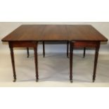 A WILLIAM IV MAHOGANY DINING TABLE comprising a pair of ‘D’ shape ends and a single leaf,